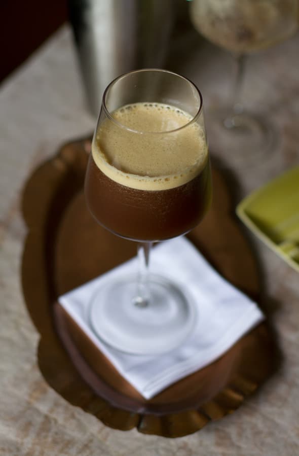 Serving of iced coffee in a wine glass