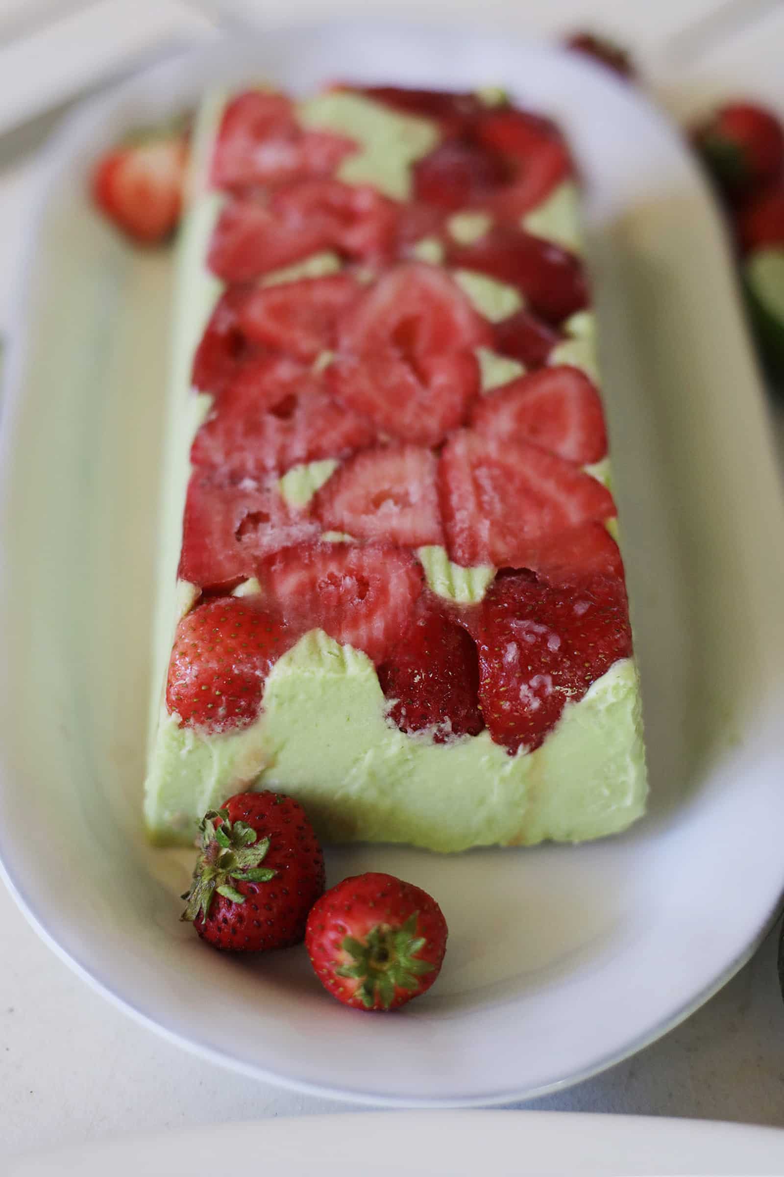 Whole Avocado Coconut Strawberry Semifreddo On A Serving Plate