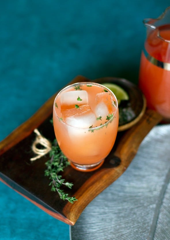 Blood orange Paloma cocktail on a serving board