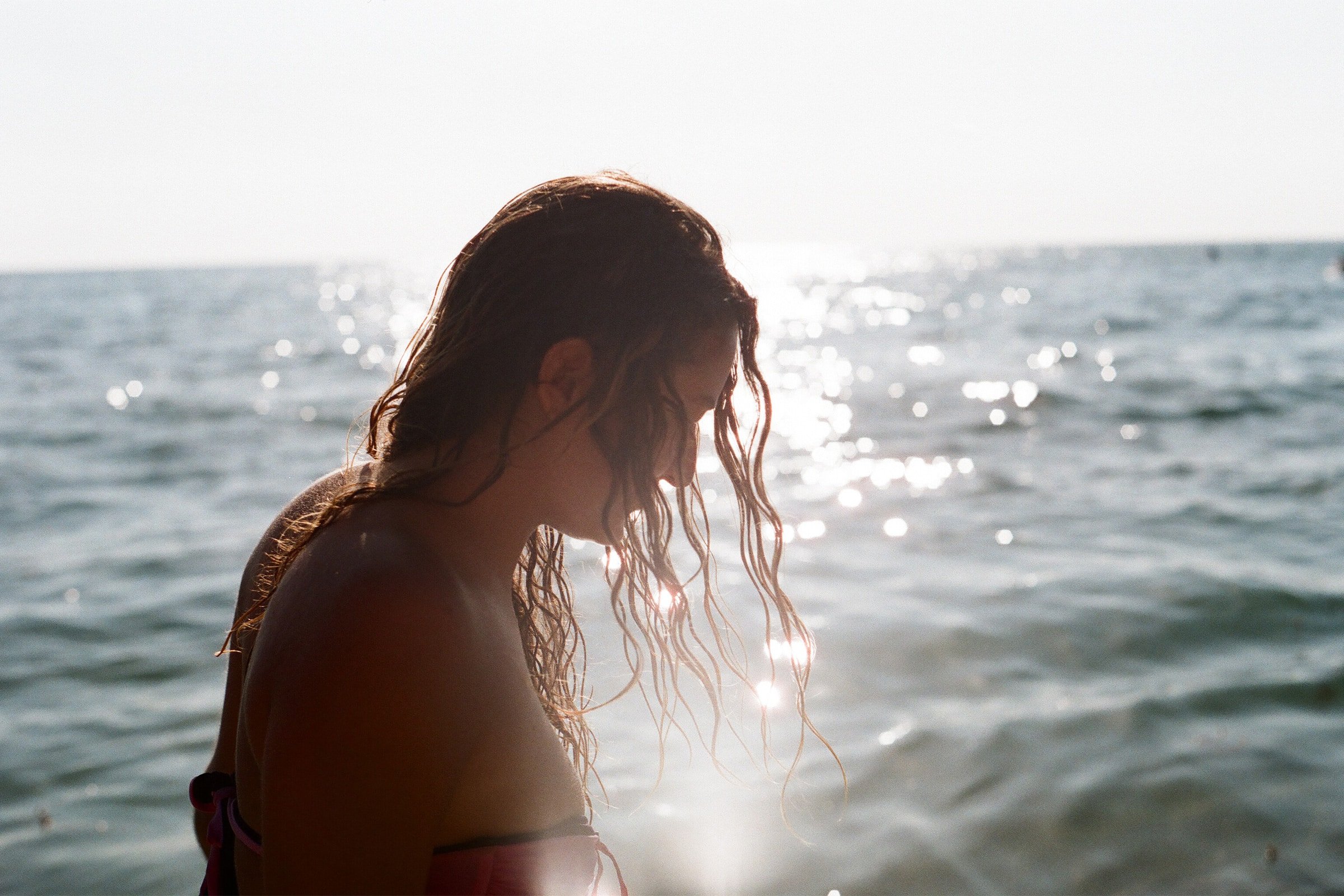 Girl At Beach Sunset