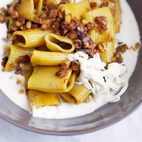 Mezzi Paccheri Pasta with Burrata Cream, Guanciale, and Saffron Recipe