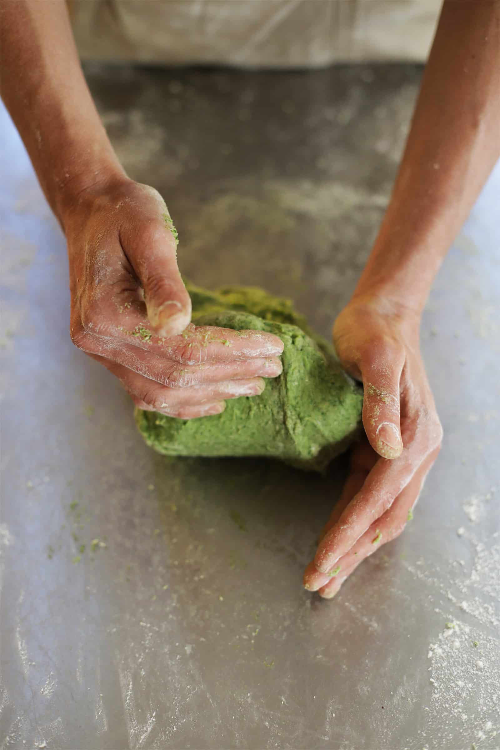 Spinach Pasta Dough Being Kneaded