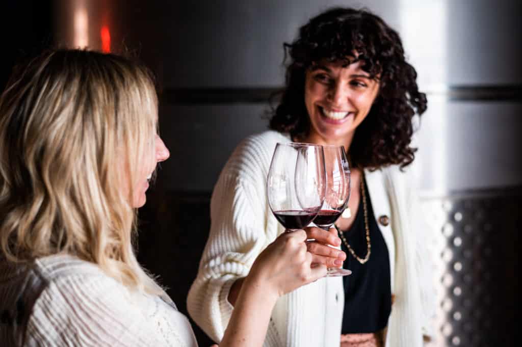 Women toasting at a wine tasting