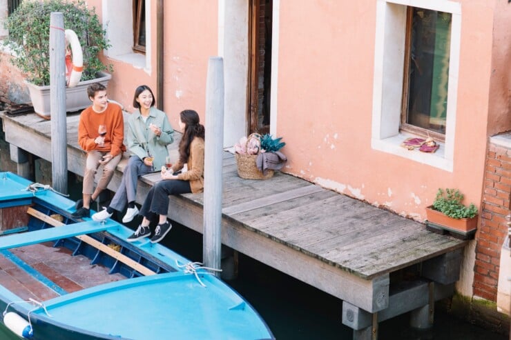 Friends on a dock in Venice