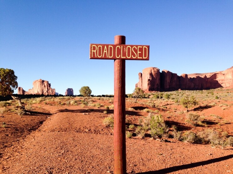 Road Closed sign on road in US southwest