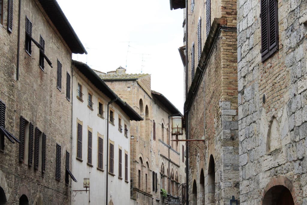 Streets of historic Tuscan town of San Gimignano Italy