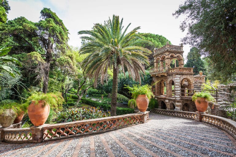 Photo of the Taormina botanical gardens with walkway and plants