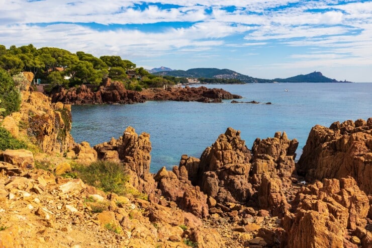 Red rocks of the Esterel contrasting with the blue Mediterranean Sea in Saint-Raphaël